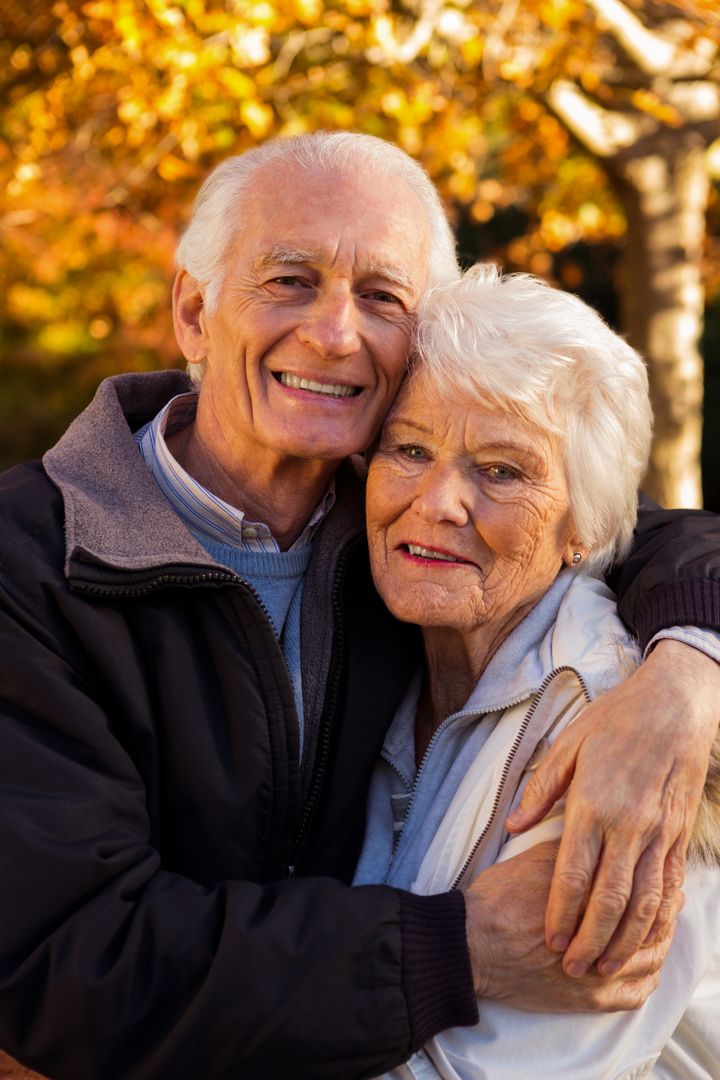Portrait of elderly couple embracing - Free Images, Stock Photos and Pictures on Pikwizard.com