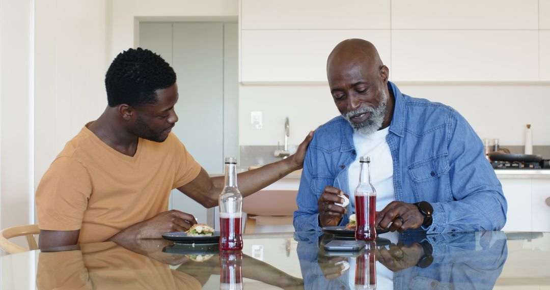 Father and Son Sharing Meal and Genuine Moment of Connection