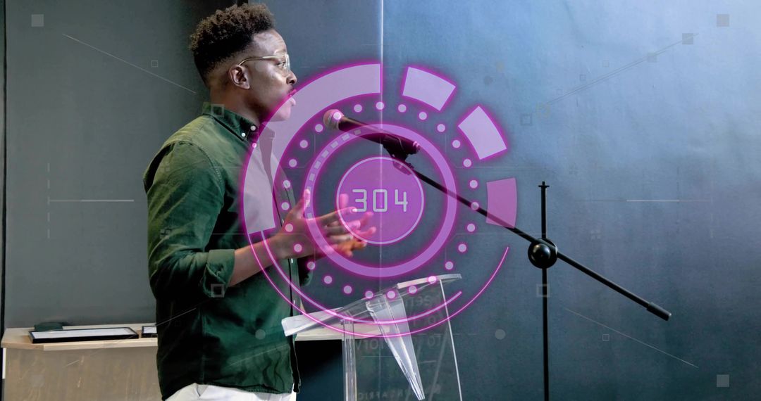 Dynamic tech speaker presenting at podium with magenta HUD overlay