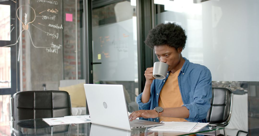 Focused Businessman Working with Laptop and Coffee