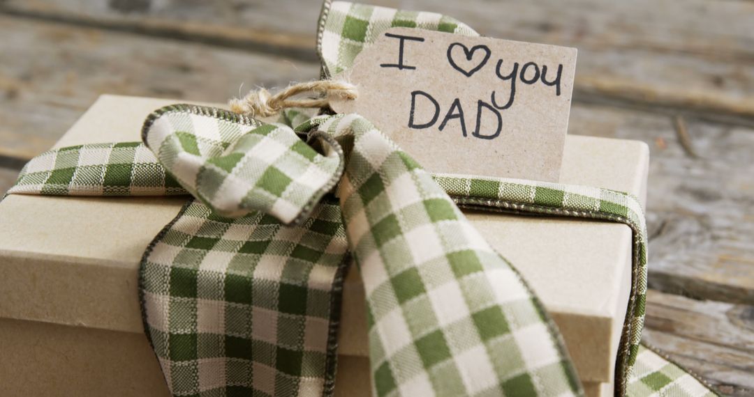 Gift Box with Love Note for Dad Tied With Gingham Ribbon - Free Images, Stock Photos and Pictures on Pikwizard.com