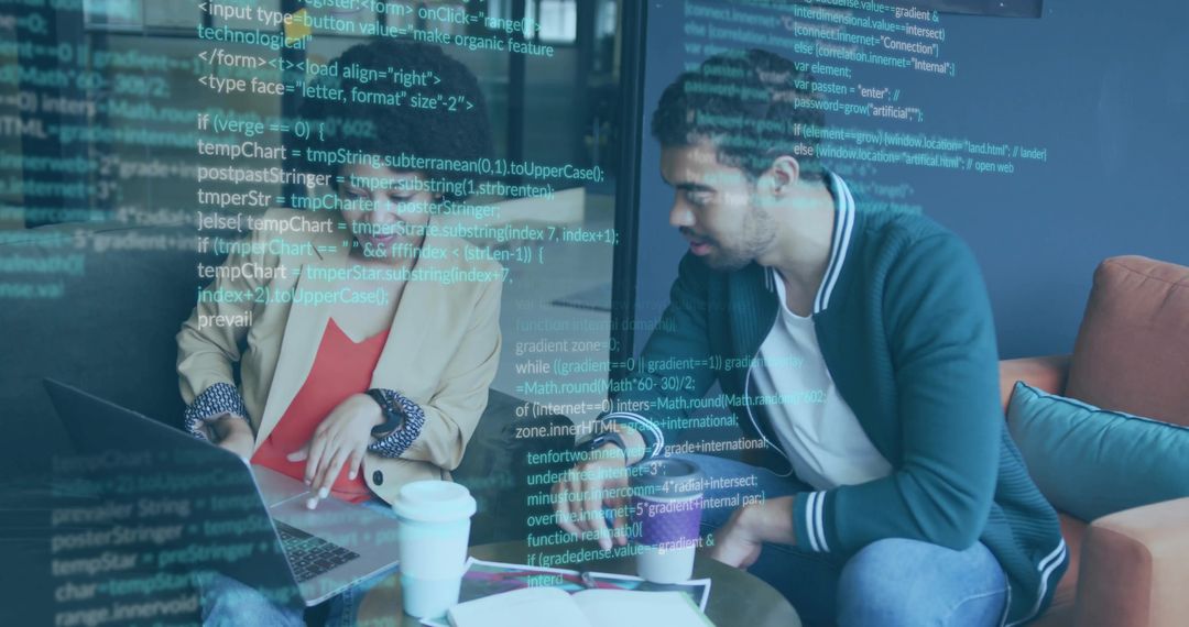 Software Developers Collaborating in Modern Office Lounge with Coffee
