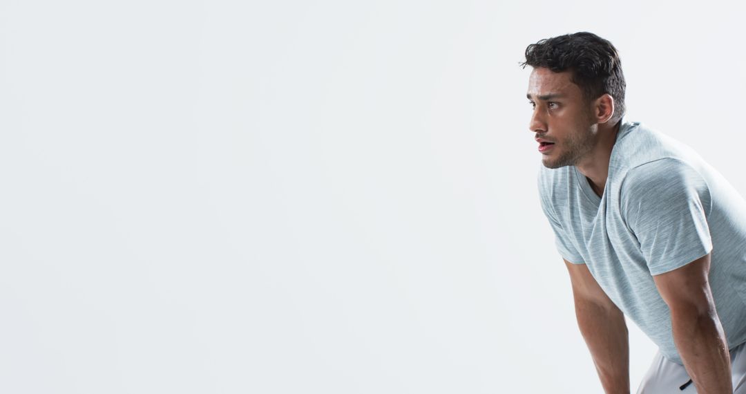 Fit Man Resting After Workout with Determined Expression