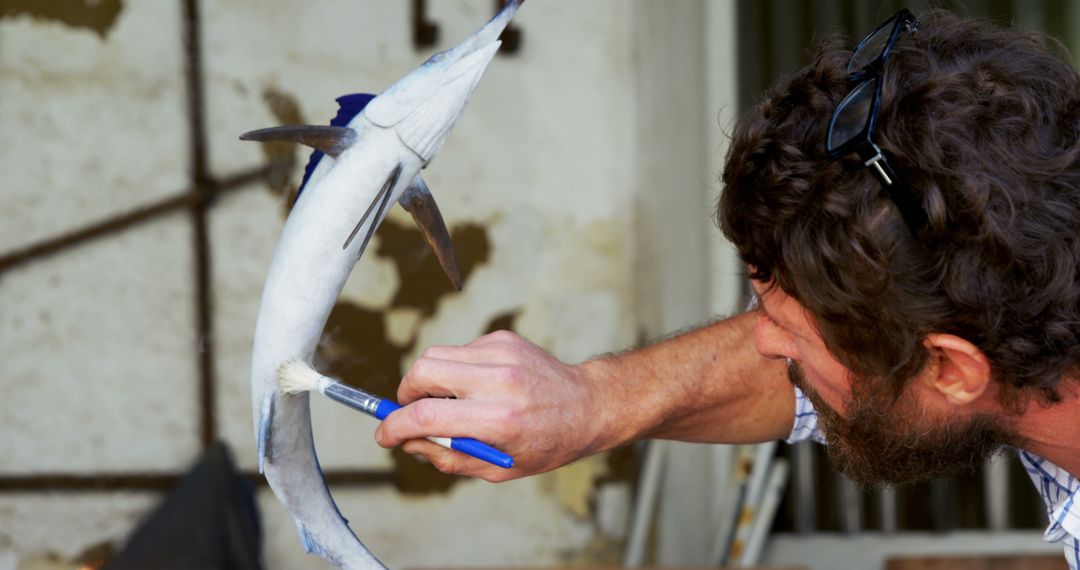 Scientist Gently Cleaning Small Shark with Brush - Free Images, Stock Photos and Pictures on Pikwizard.com