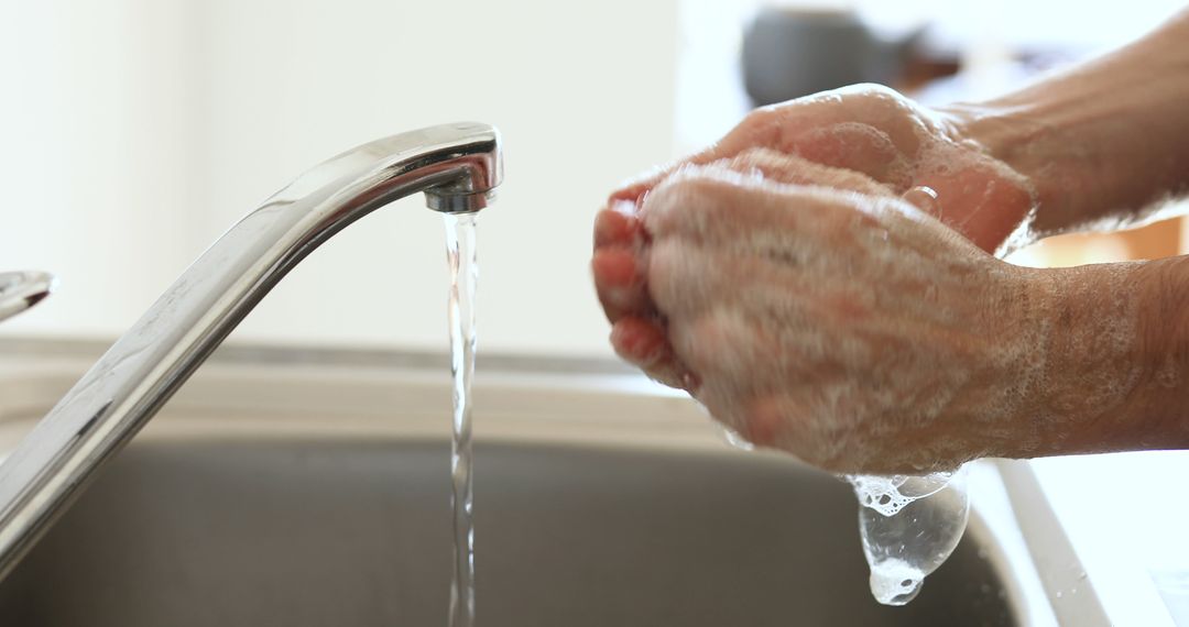 Washing hands thoroughly under running water - Free Images, Stock Photos and Pictures on Pikwizard.com