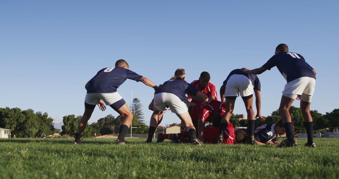 Youth Rugby Players Competing Hard on Sunny Day - Free Images, Stock Photos and Pictures on Pikwizard.com