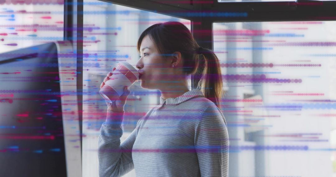 Asian Software Developer Drinking Coffee with Code Overlay