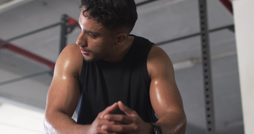Exhausted Athlete Resting During Intense Workout Routine