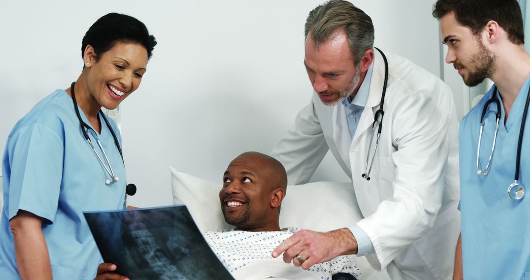 Medical Team Discussing Patient's X-ray Results - Free Images, Stock Photos and Pictures on Pikwizard.com