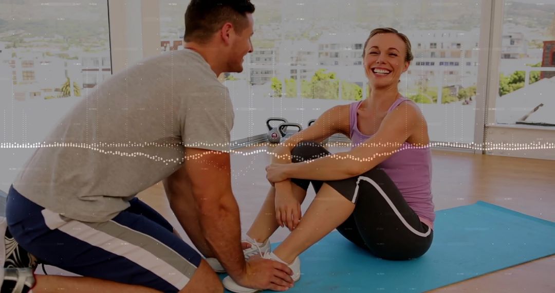 Dynamic Fitness Duo Engaging in Stretch Routine