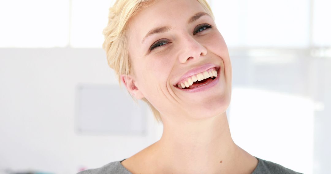 Close-up of Smiling Young Woman with Short Hair - Free Images, Stock Photos and Pictures on Pikwizard.com