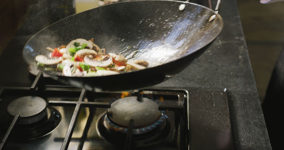 Chef Cooking Vegetables in Wok on Gas Stove - Free Images, Stock Photos and Pictures on Pikwizard.com