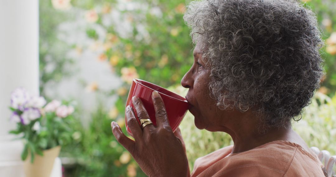 Senior Woman Enjoying Morning Coffee in Garden - Free Images, Stock Photos and Pictures on Pikwizard.com