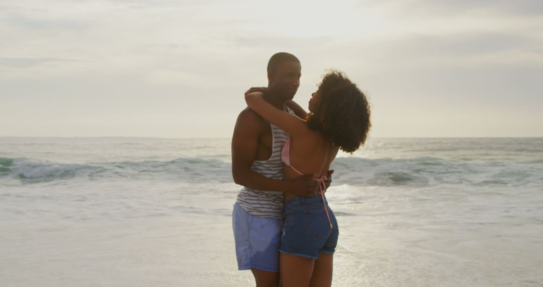 Romantic Couple Dancing on Ocean Beach Embracing