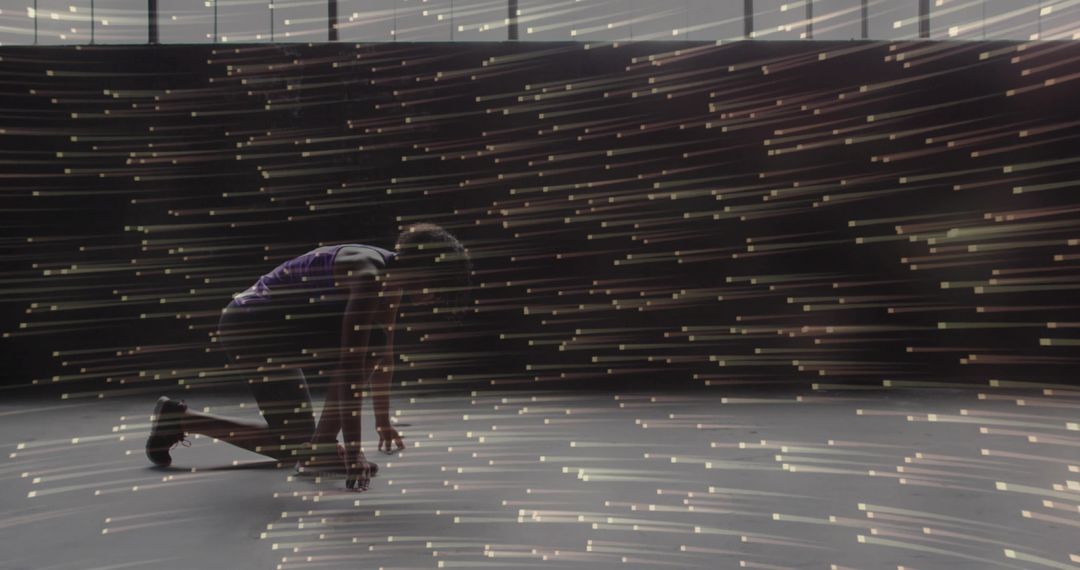 Sprinter crouching at start with dynamic light trails and motion blur, dramatic studio