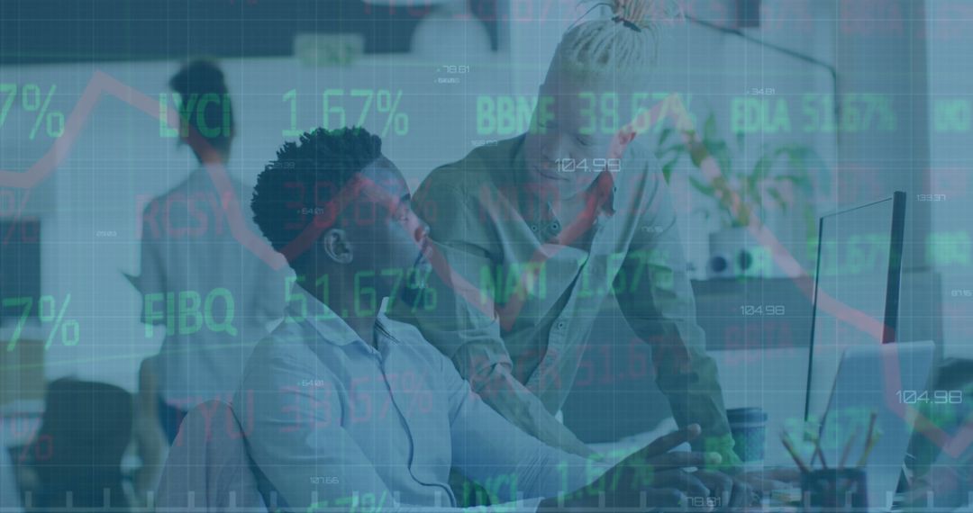 Diverse Coworkers Discussing Financial Data in Modern Office