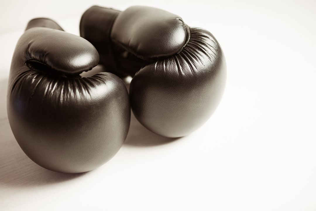 Black Boxing Gloves on White Background - Free Images, Stock Photos and Pictures on Pikwizard.com