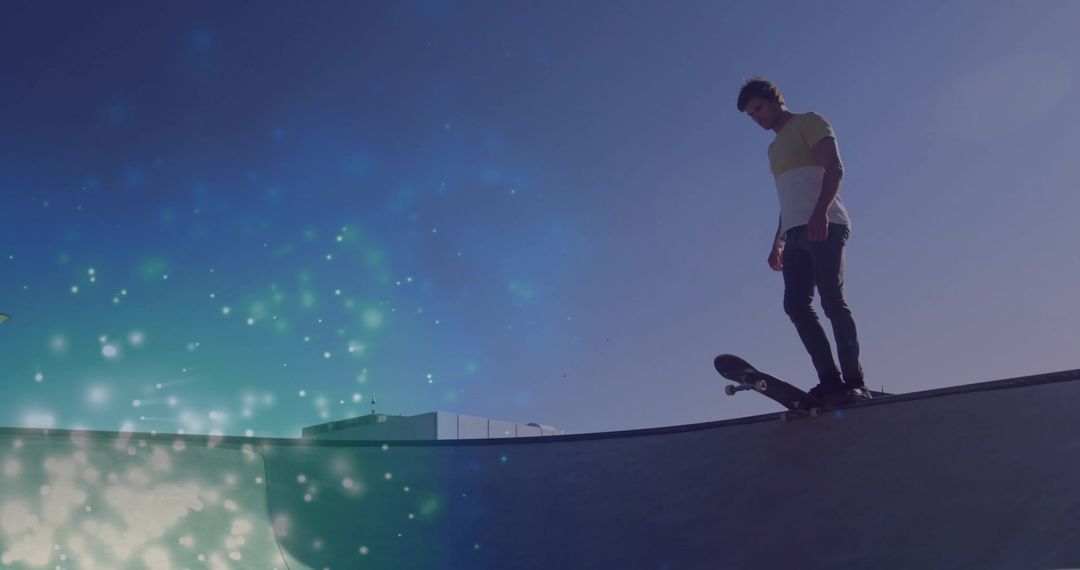 Balancing Skateboarder on Ramp Against Luminous Background