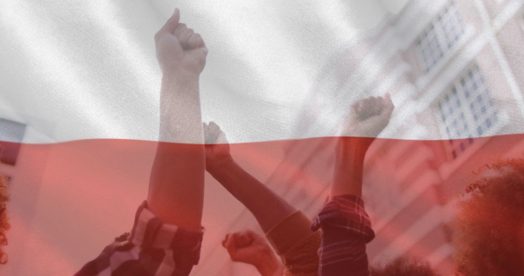 Protestors with Raised Fists Under Polish Flag