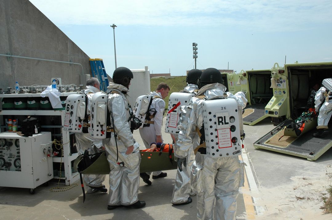 NASA Emergency Rescue Team in Protective Suits Training at Kennedy Space Center