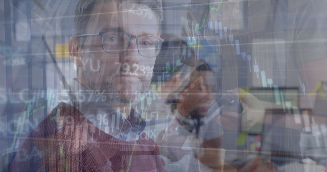 Financial Analysts Examining Real-Time Stock Data on Screens