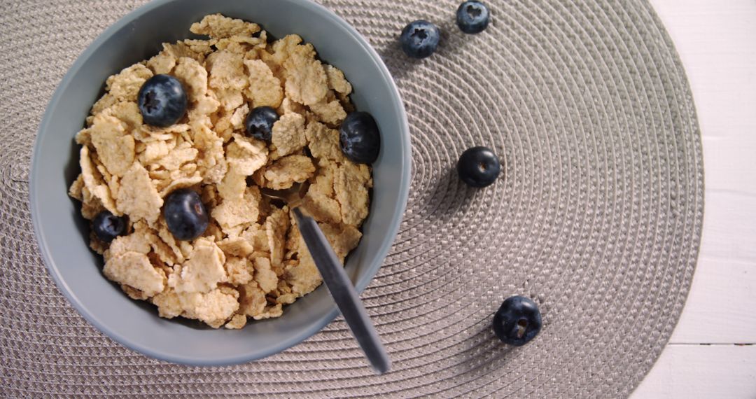 Healthy Breakfast with Bran Cereal and Fresh Blueberries - Free Images, Stock Photos and Pictures on Pikwizard.com