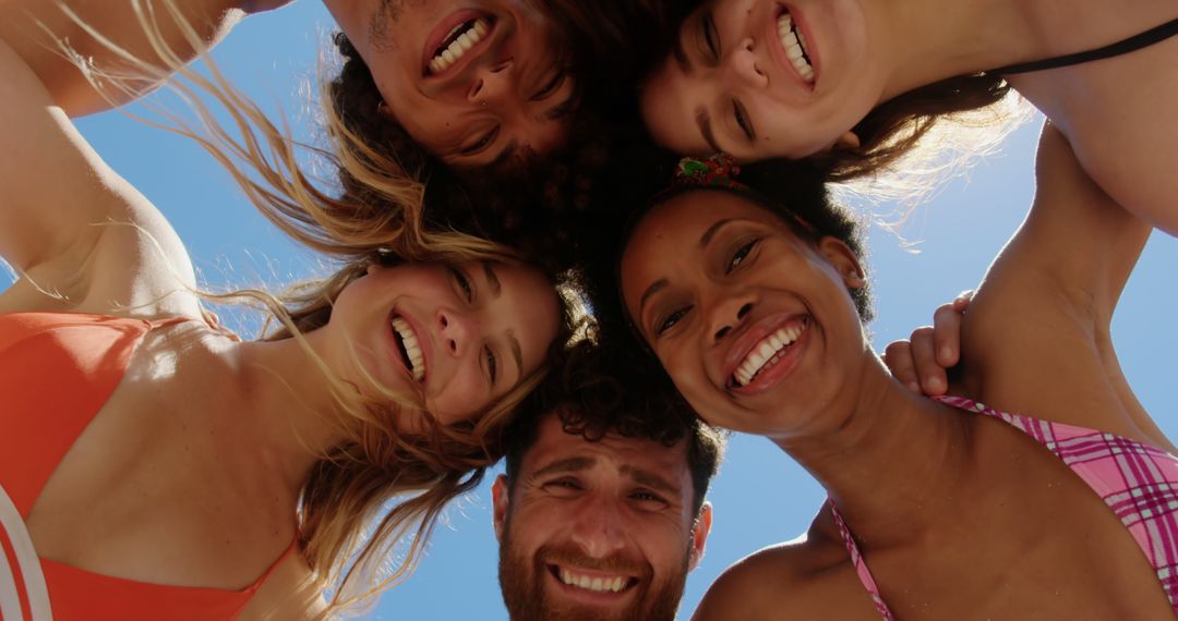 Friends Smiling at Beach in Swimwear Enjoying Summer - Free Images, Stock Photos and Pictures on Pikwizard.com