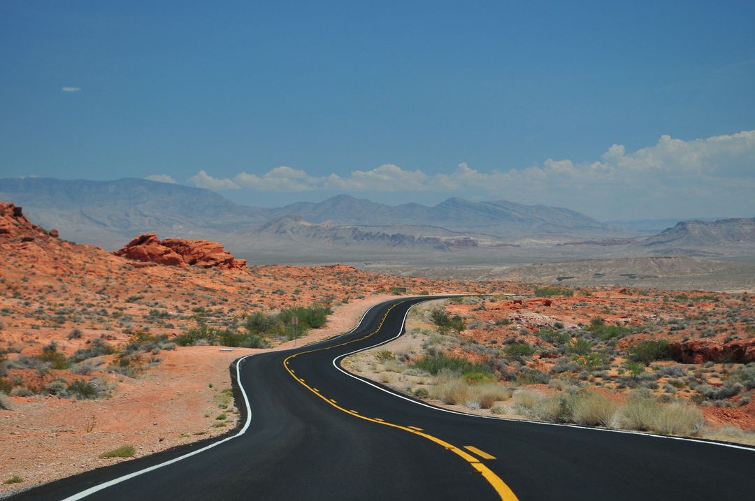 Winding Desert Road in Scenic Landscape - Free Images, Stock Photos and Pictures on Pikwizard.com