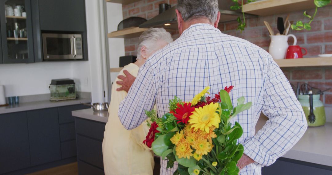 Senior Man Holding Flowers Behind Back While Embracing Partner - Free Images, Stock Photos and Pictures on Pikwizard.com