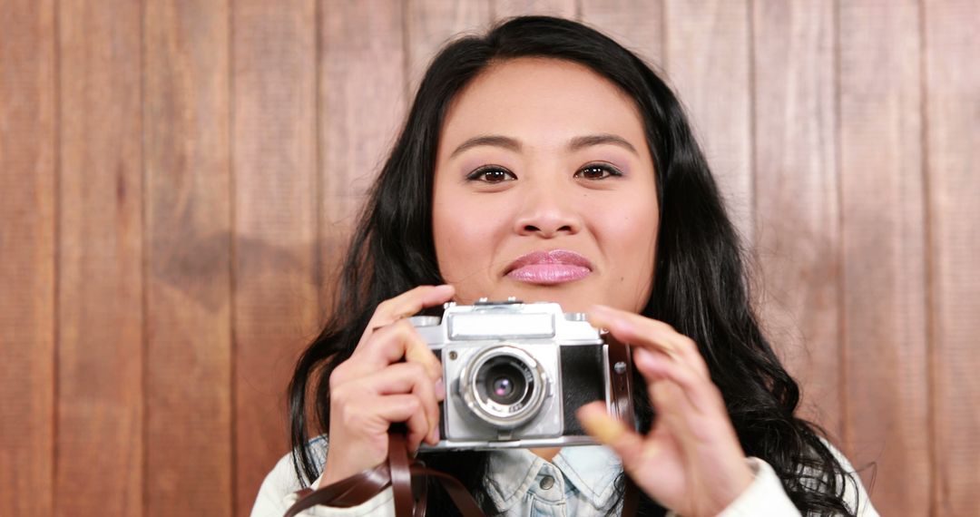 Young Woman Holding Vintage Camera Happy Photography - Free Images, Stock Photos and Pictures on Pikwizard.com