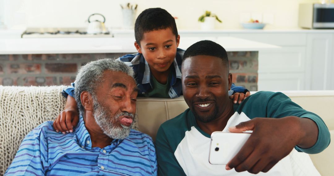 Three Generations of African American Men Taking Selfie in Living Room - Free Images, Stock Photos and Pictures on Pikwizard.com