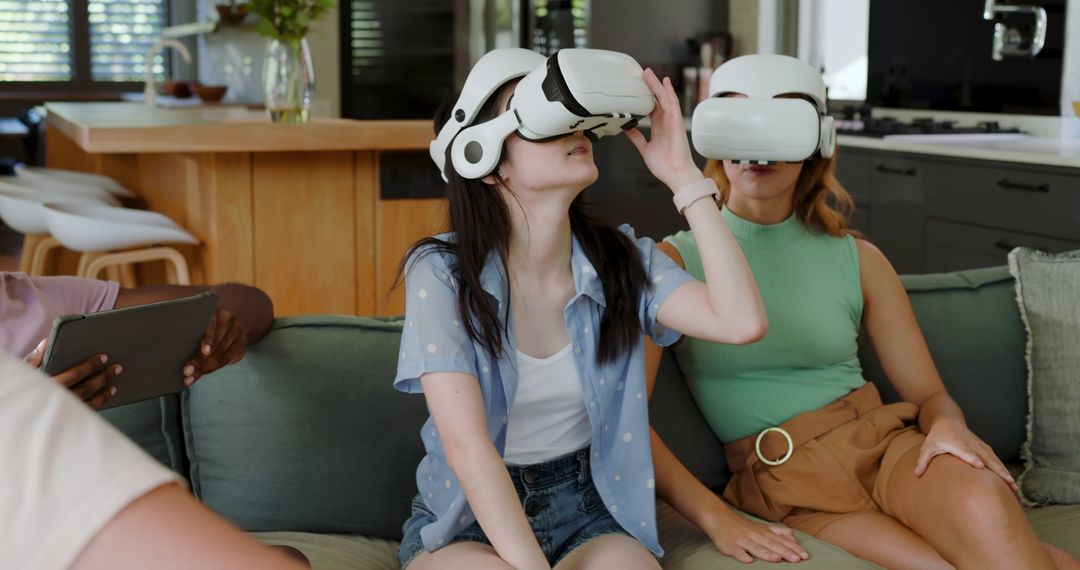 Friends Experiencing Virtual Reality in Modern Home Setting