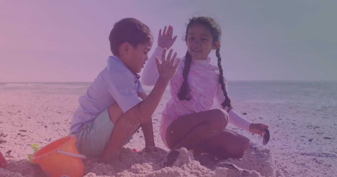 Happy Siblings Playing on Sunny Beach, Celebrating Connection