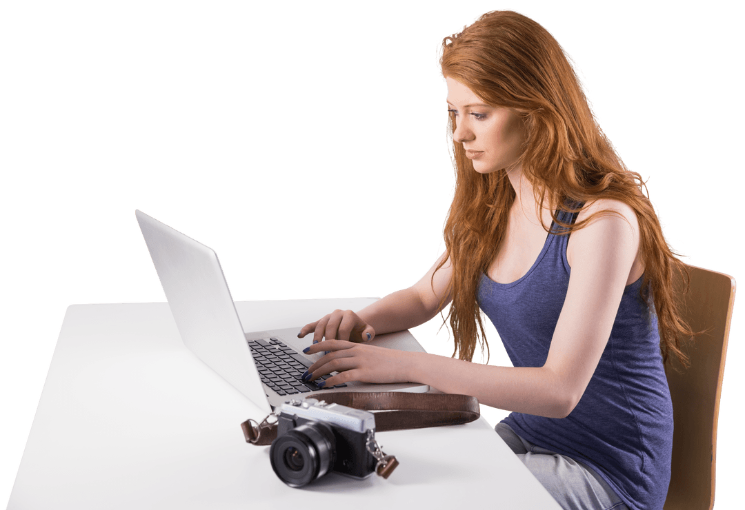 Focused Redhead Using Laptop on Transparent Background
