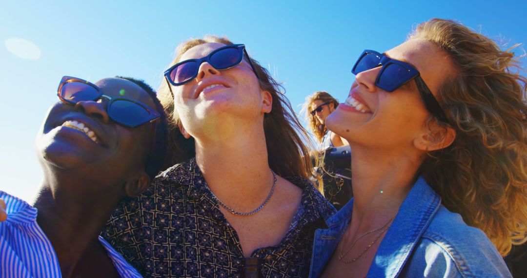 Joyful Diverse Women Enjoy Road Trip Adventure Under Blue Sky - Free Images, Stock Photos and Pictures on Pikwizard.com