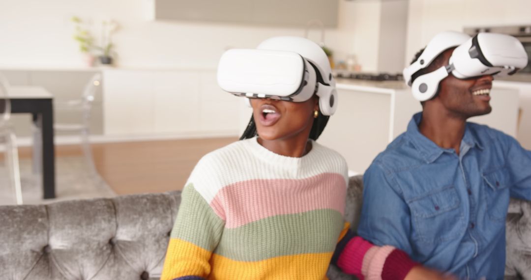 Couple Enjoying Virtual Reality Experience at Home