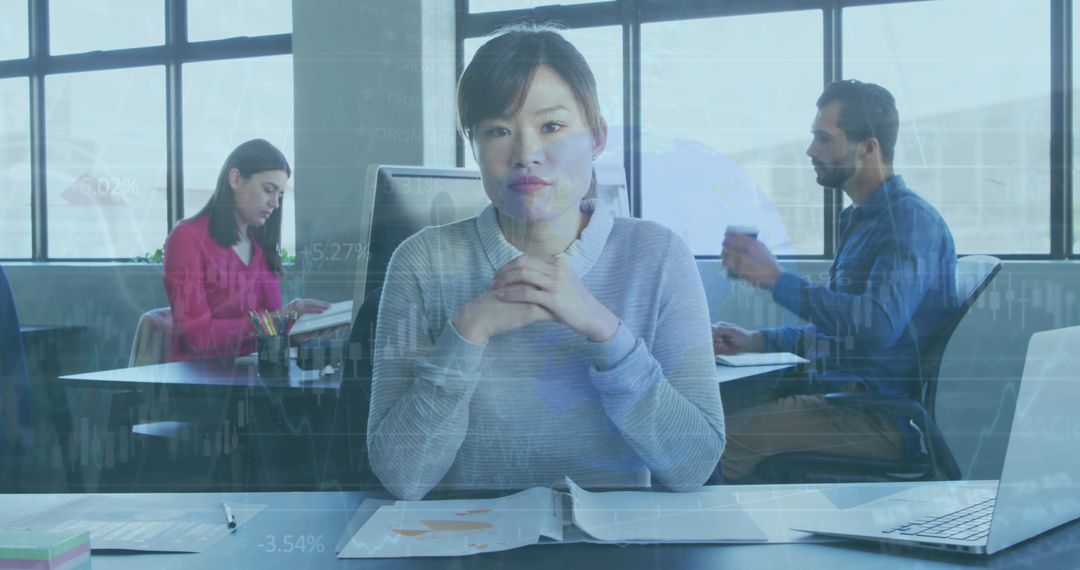 Office Team Collaborating on Financial Analysis Project