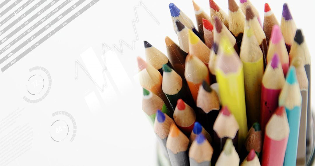 Vibrant Colored Pencils Cluster Standing Upright with Minimal Chart Overlay and Copy Space