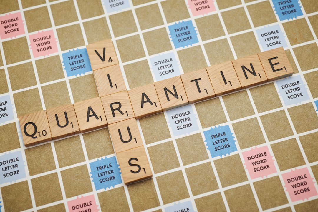 Scrabble Letters Forming Words Virus and Quarantine