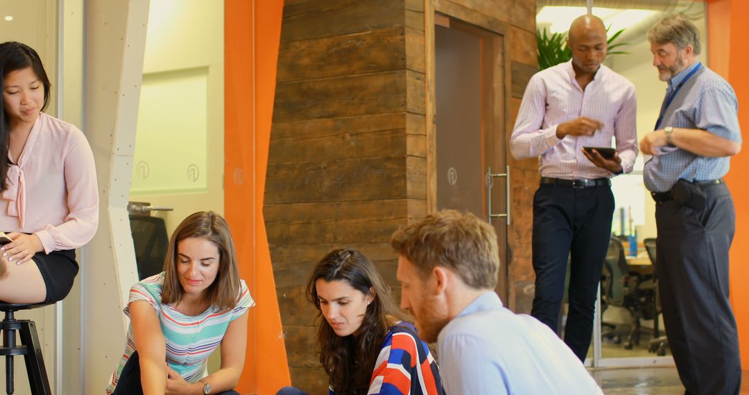 Team Collaborating in Modern Office Workspace