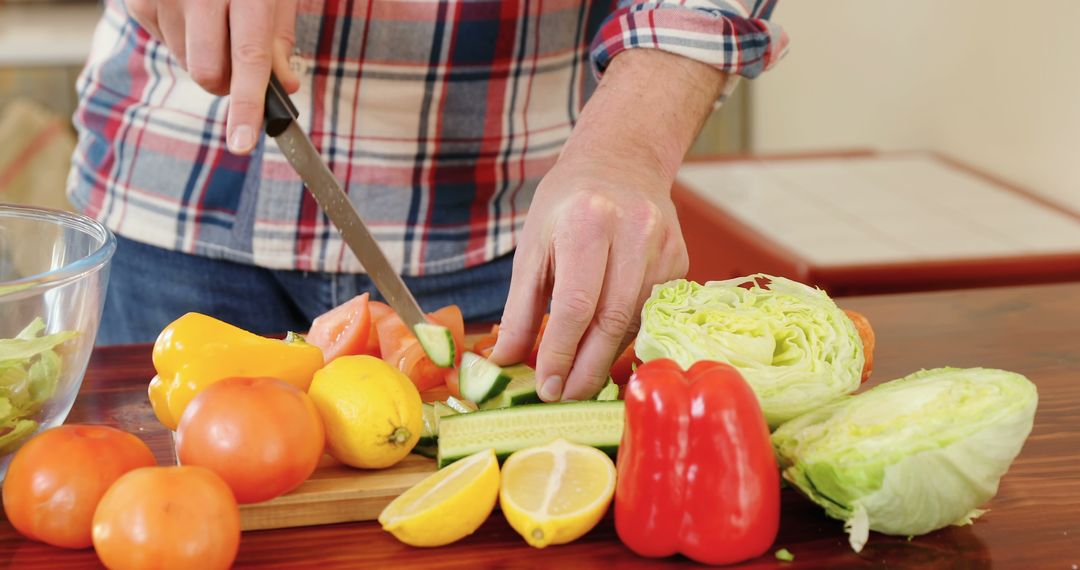 Person Chopping Fresh Vegetables for Healthy Meal Preparation - Free Images, Stock Photos and Pictures on Pikwizard.com