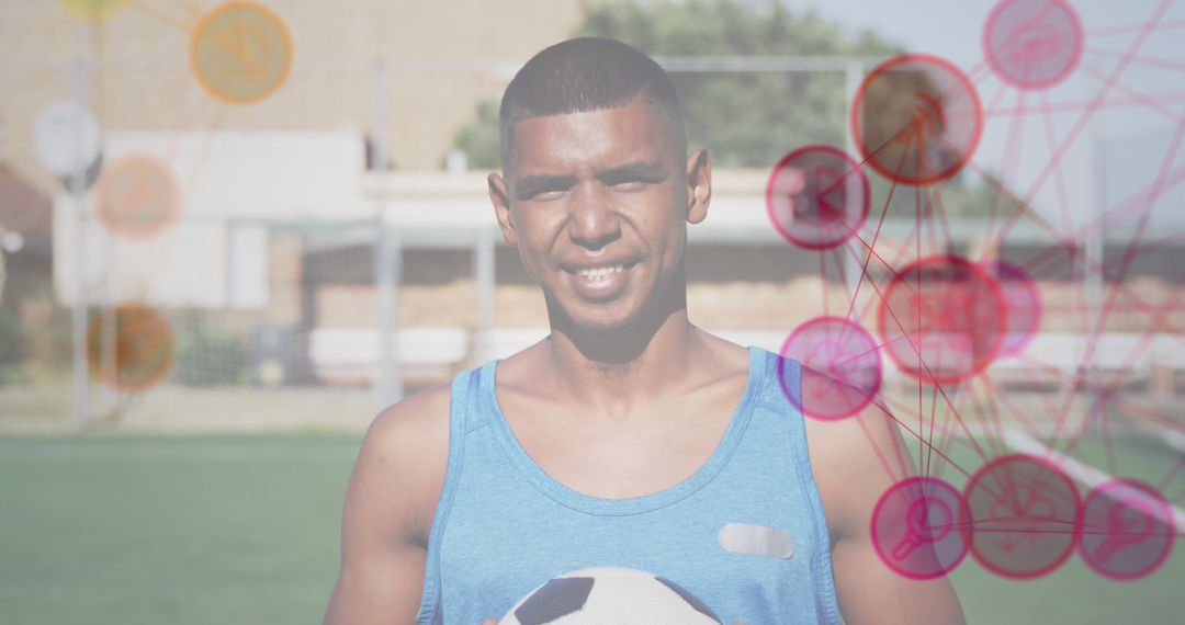 Young Athlete Holding Soccer Ball on Field with Data Technology Overlay - Free Images, Stock Photos and Pictures on Pikwizard.com