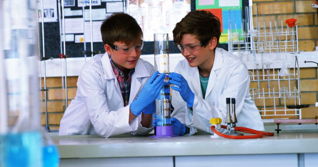 Two Boys Conducting Science Experiment in Classroom - Free Images, Stock Photos and Pictures on Pikwizard.com