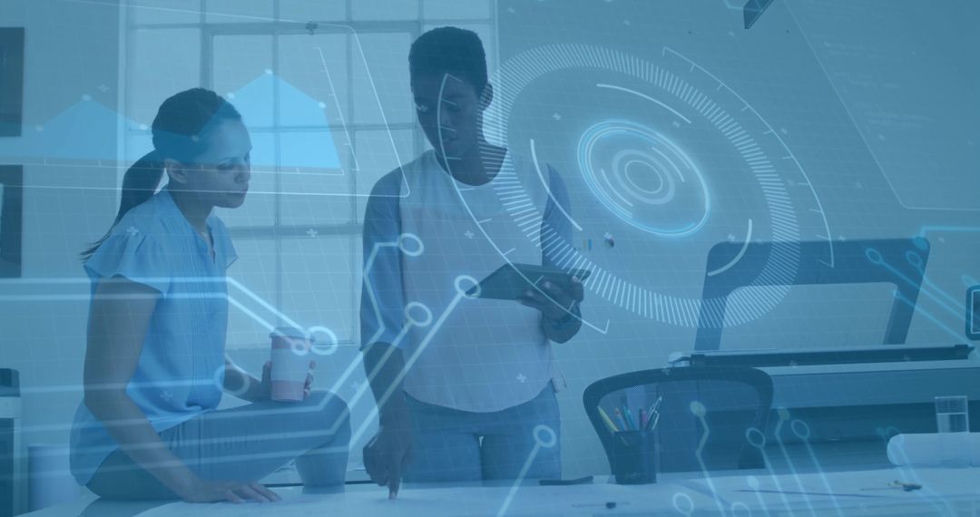 Women Collaborating on Project with Futuristic Digital Interface