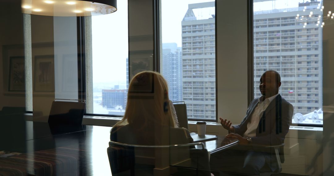 Business Meeting in Modern Office with City Skyline View - Free Images, Stock Photos and Pictures on Pikwizard.com