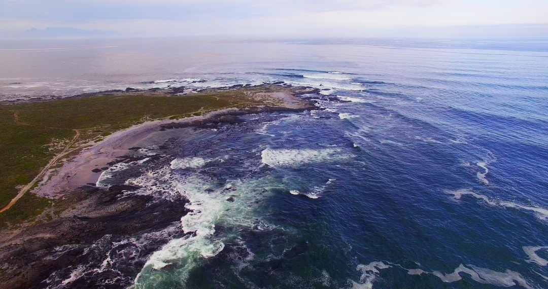 Aerial View of Rocky Coastal Landscape and Transparent Ocean Waters - Download Free Stock Images Pikwizard.com