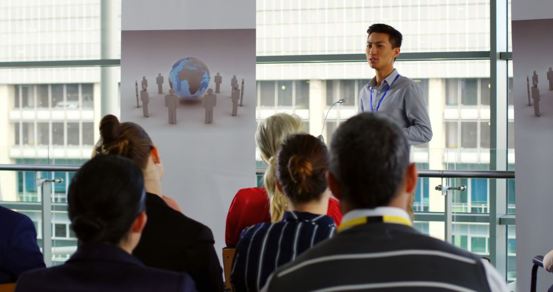 Asian Male Presenter Leading Business Seminar Conference - Free Images, Stock Photos and Pictures on Pikwizard.com