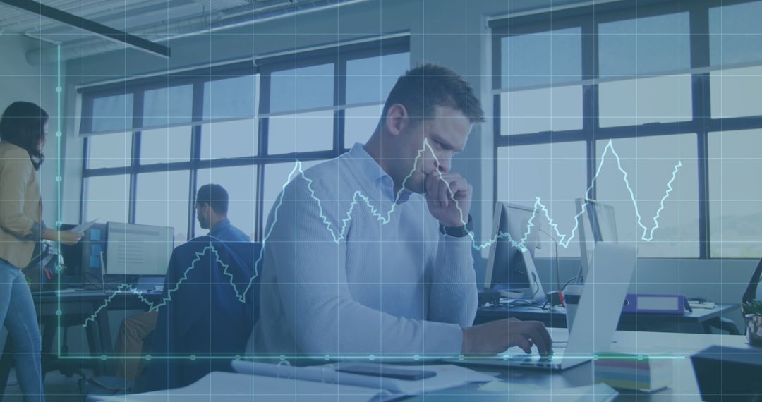 Business Analyst Evaluating Growth Data on Laptop