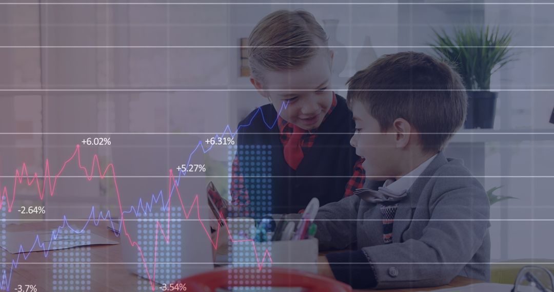 Young Entrepreneurs Analyzing Financial Data on Laptop