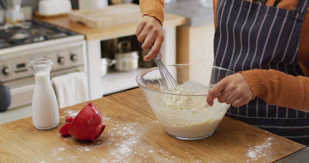 Person Mixing Dough in Kitchen, Preparing Homemade Food - Free Images, Stock Photos and Pictures on Pikwizard.com